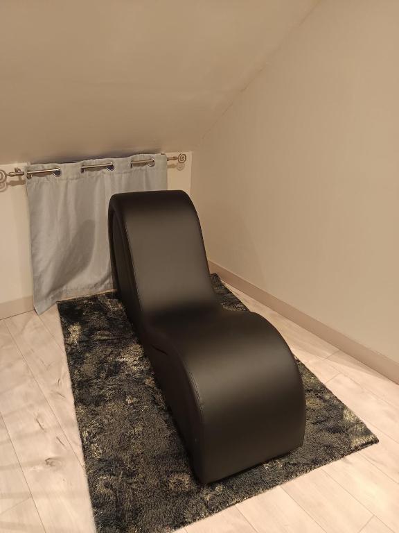 Fauteuil de détente en cuir noir